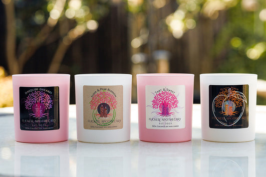 Fruity scented candles by Flicker Apothecary featuring peach, cherry, citrus and berry fragrances in amber glass jars styled in a bright, fresh home setting.